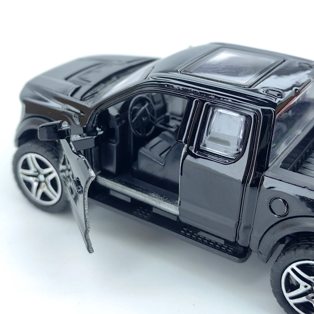Boy’s treasured metal miniature racing car, realistic spring-powered off-road vehicle, baby-sized toy car.