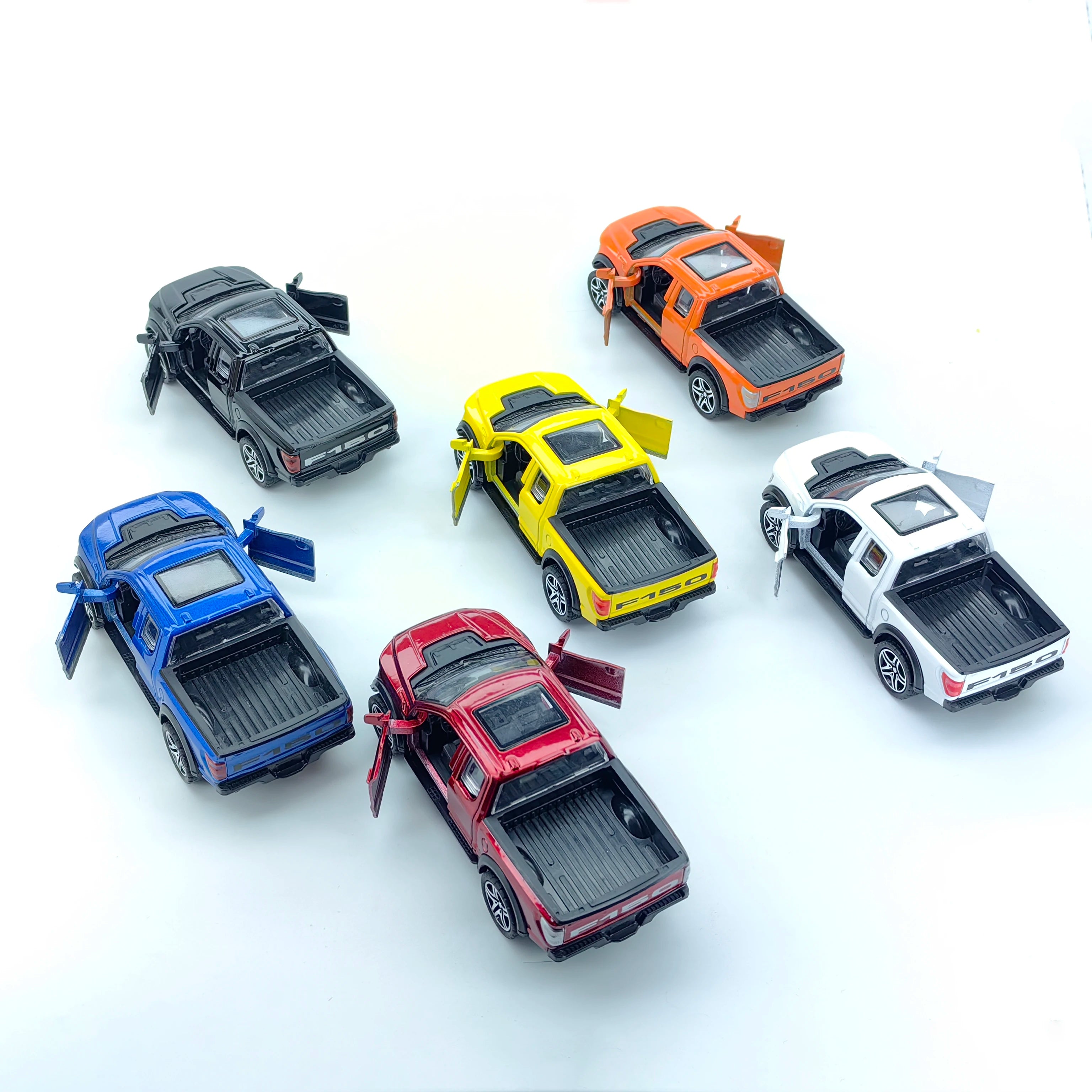 Boy’s treasured metal miniature racing car, realistic spring-powered off-road vehicle, baby-sized toy car.