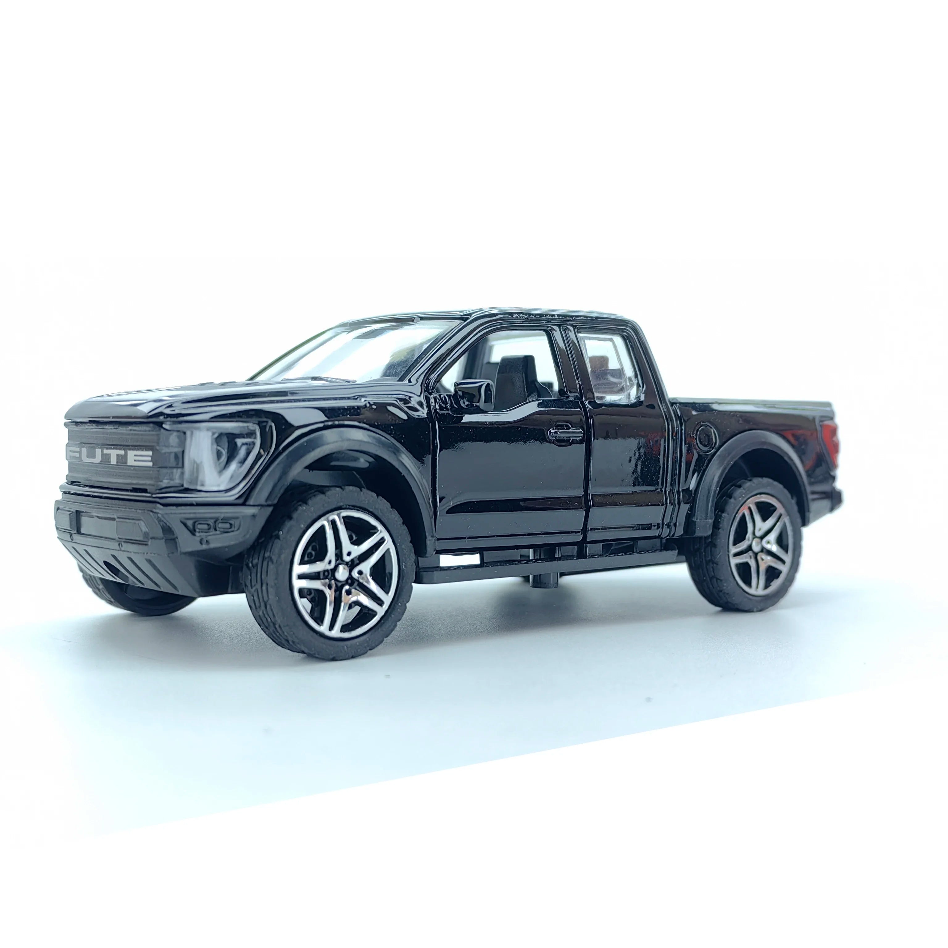 Boy’s treasured metal miniature racing car, realistic spring-powered off-road vehicle, baby-sized toy car.
