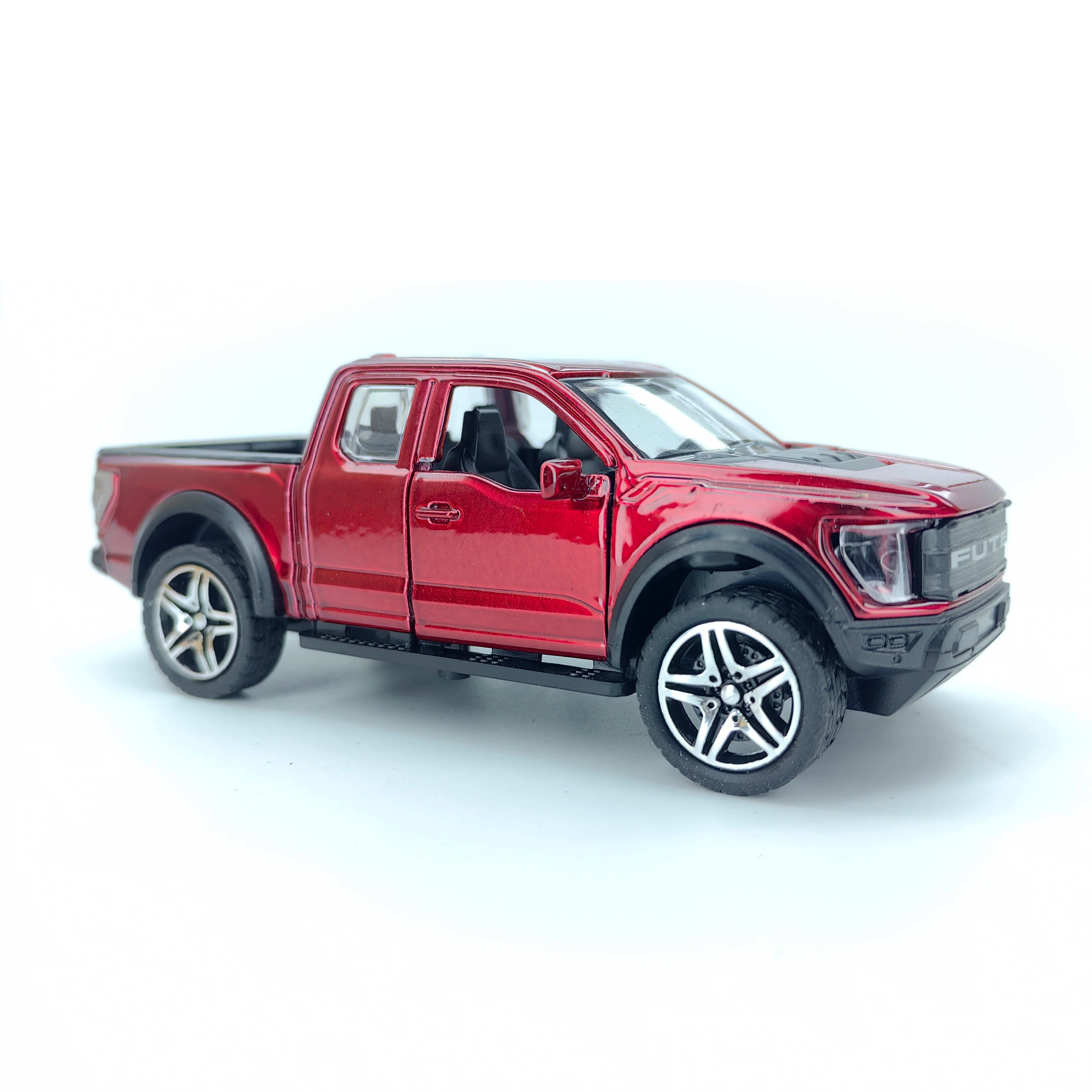 Boy’s treasured metal miniature racing car, realistic spring-powered off-road vehicle, baby-sized toy car.