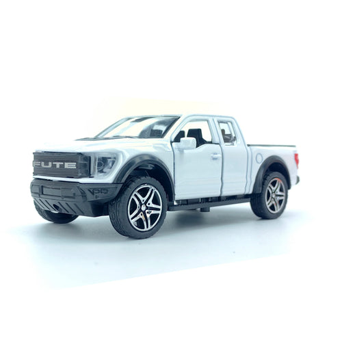 Boy’s treasured metal miniature racing car, realistic spring-powered off-road vehicle, baby-sized toy car.